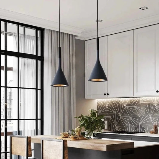 Black Modern Scandinavian pendant light shown lighting a kitchen island