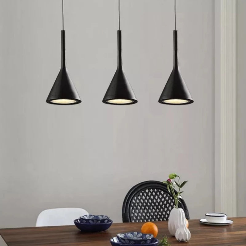 Black Modern Pendant Light in Scandinavian Style shown lighting a dining room table