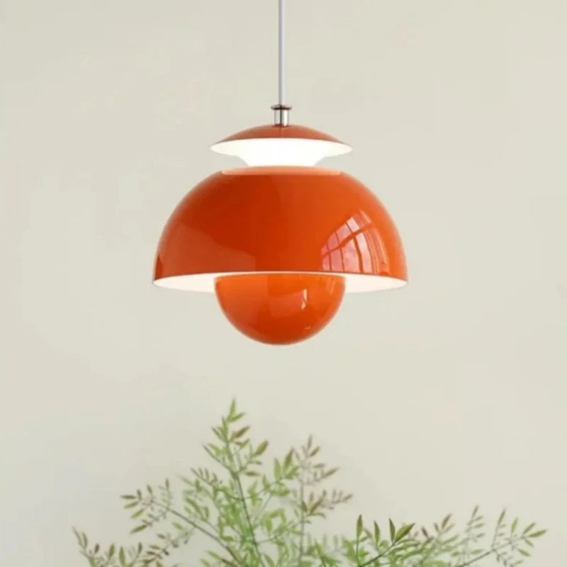 Modern Scandinavian pendant lighting shown in orange