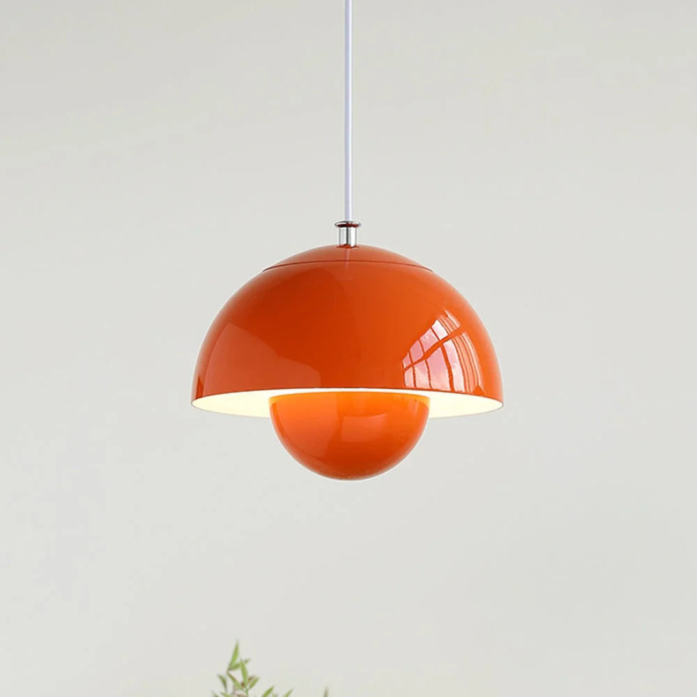 Modern scandinavian pendant light shown in orange