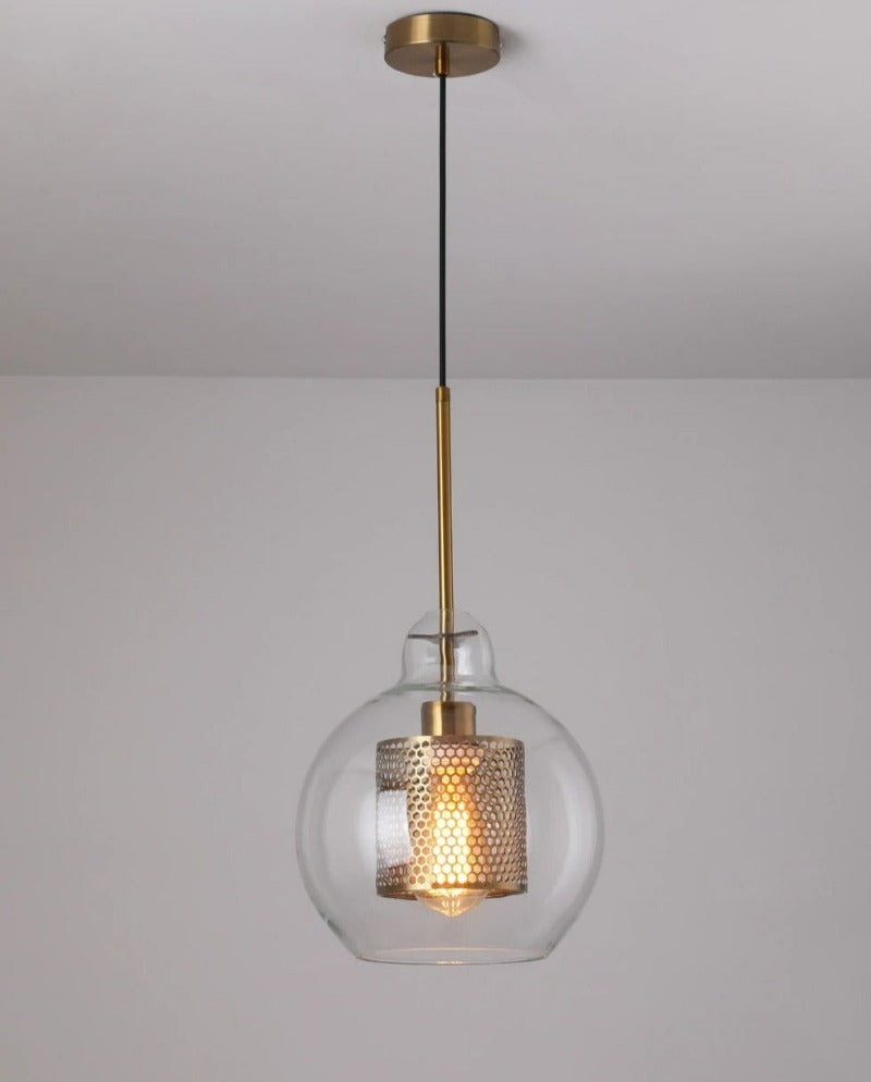 clear glass globe pendant lights with interior honeycomb shade shown in brushed gold finish