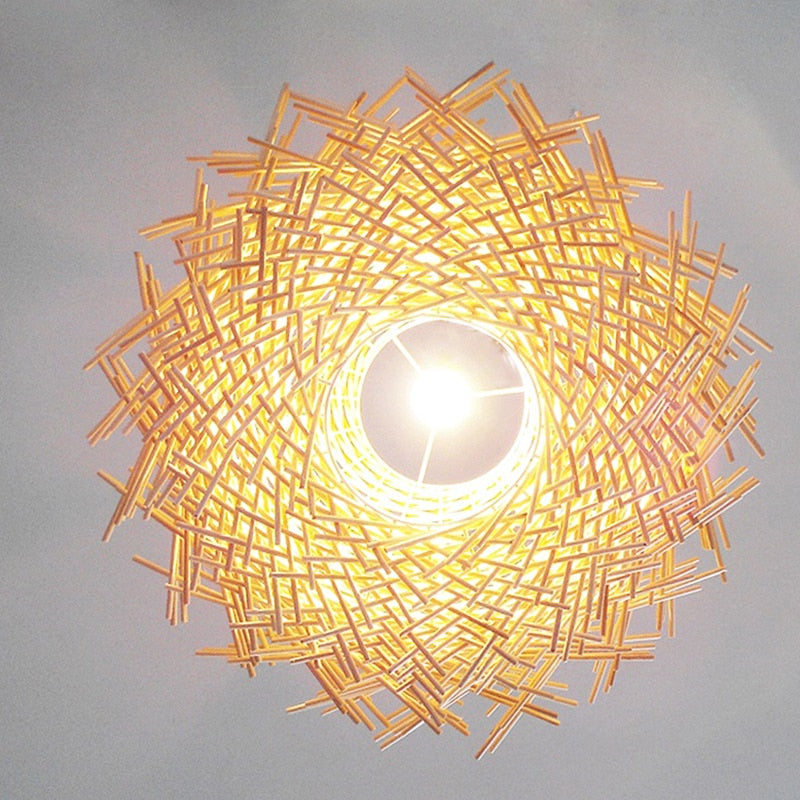 Hand Woven Rattan birds nest hanging pendant light in natural shown from below