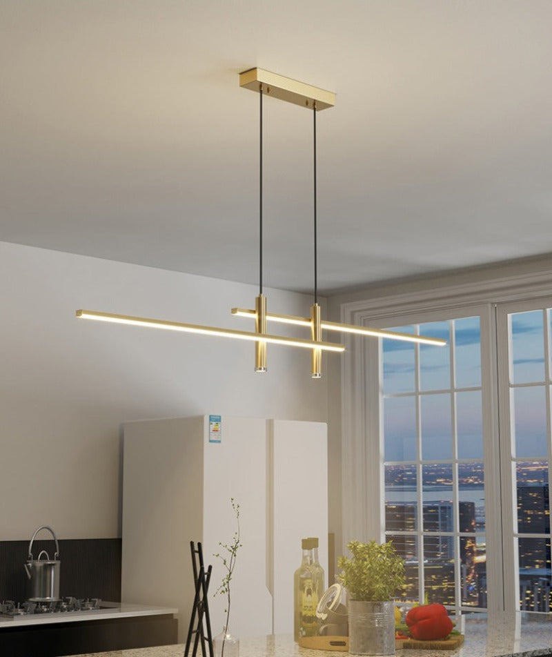 Modern Hanging Horizontal Light with two spotlights, 47 inches wide, gold aluminum Frame shown illuminating a modern kitchen island
