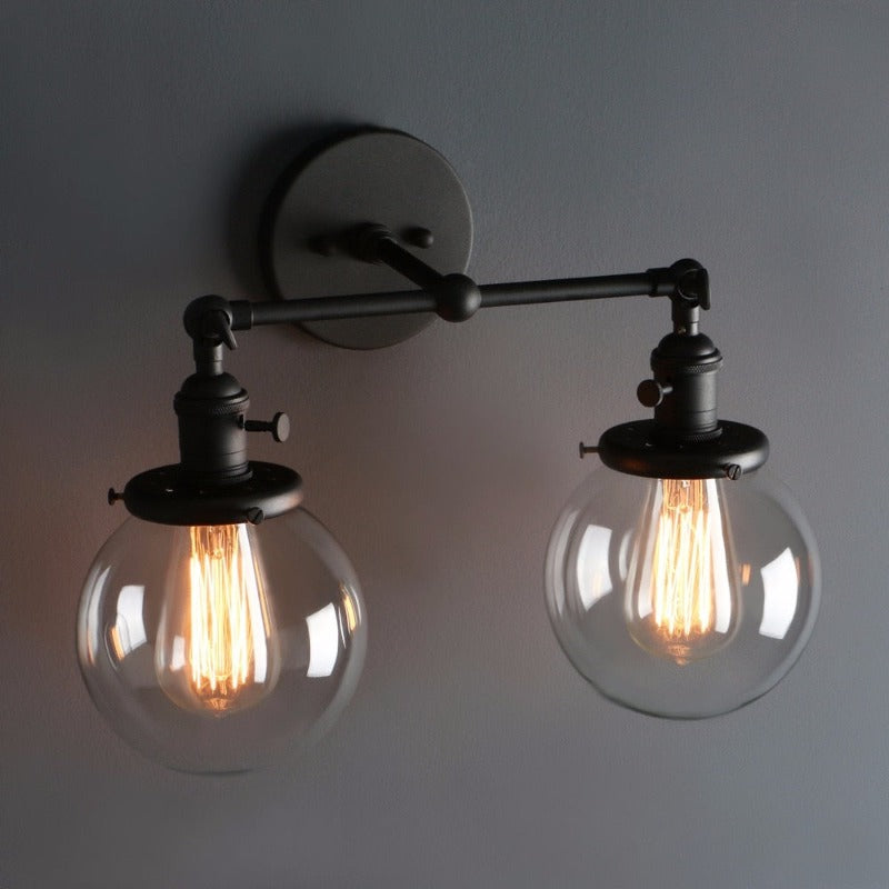 farmhouse Style Double Globe Edison Bulb Wall sconce shown in black finish