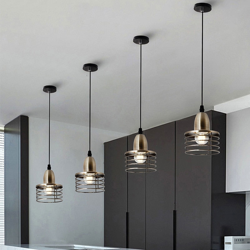 Industrial caged spotlights in bronze