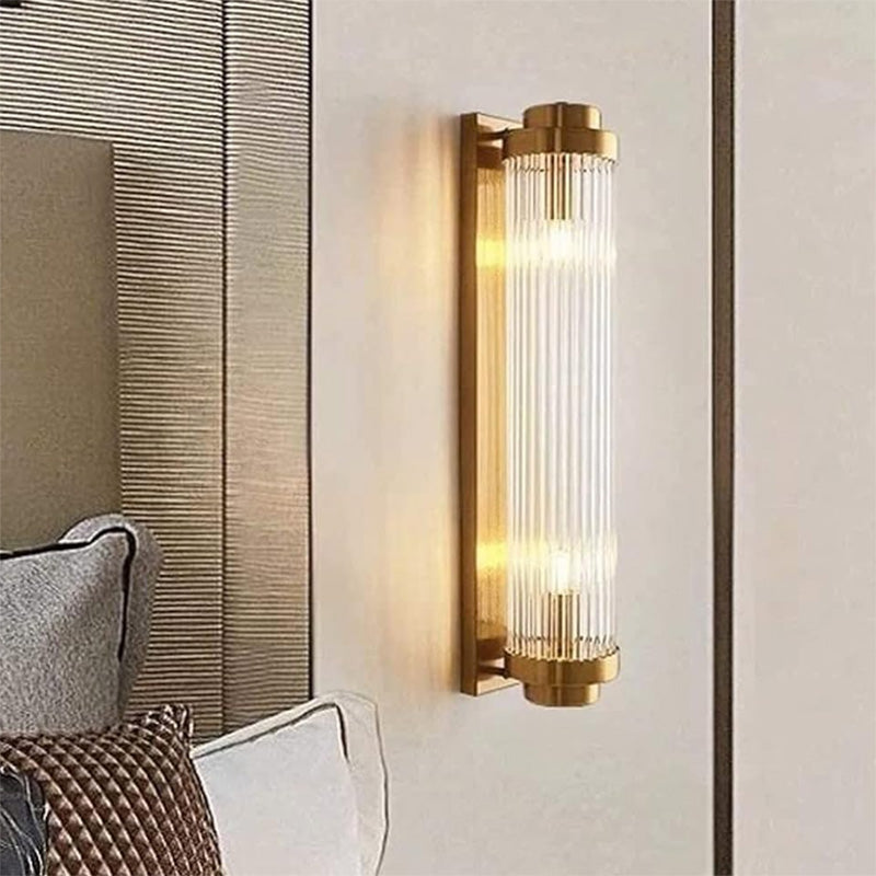 Dalton Deco Style Fluted column wall sconce shown in bedroom