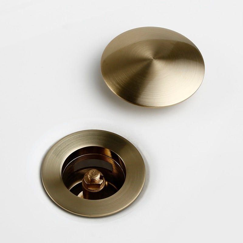 close up detail of Pop Up Bathroom Sink Drain in  brushed gold 