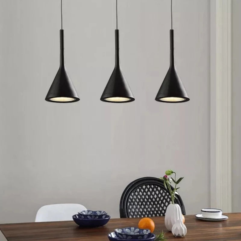 Black Modern Pendant Light in Scandinavian Style shown  lighting a dining room table