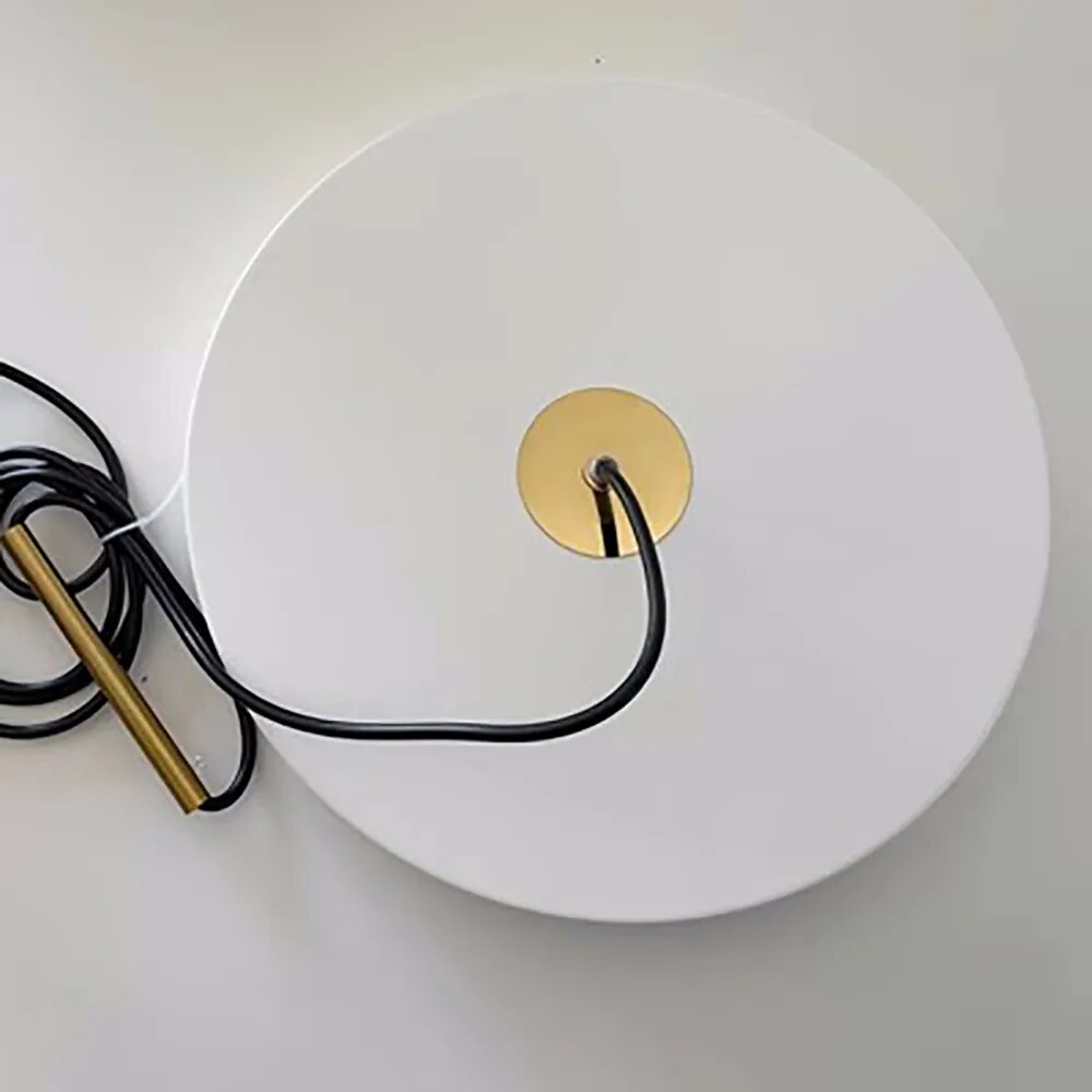 detail of white minimalist hanging pendant light