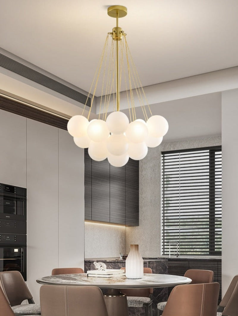 modern multi-globe bubble chandelier with gold hardware in small