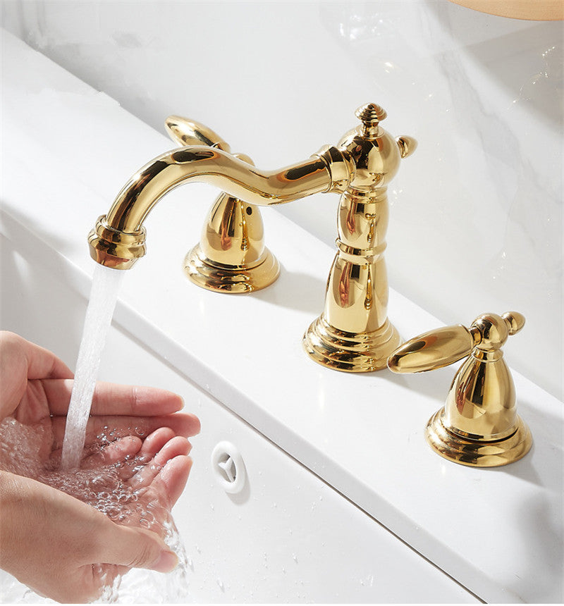 Details of elegant polished gold antique widespread bathroom faucet