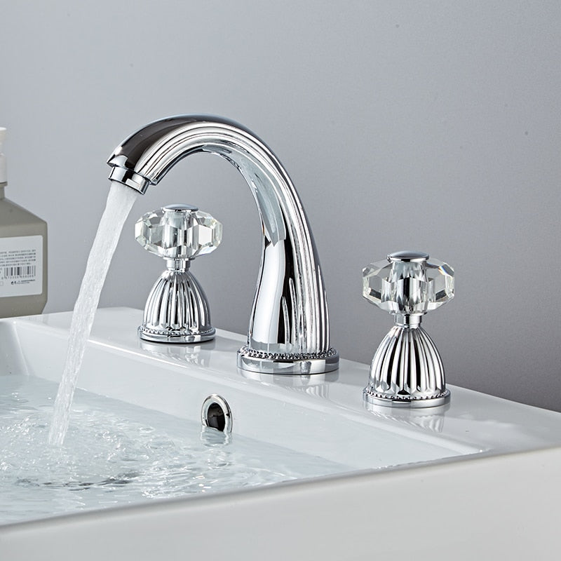 Luxury Polished Chrome bathroom faucet. Three hole widespread bathroom faucet with faceted crystal handles