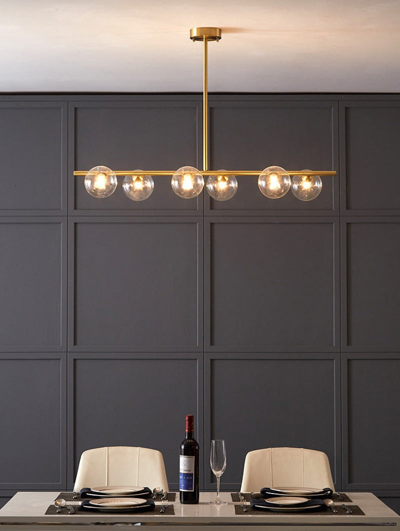 Clear glass six bulb horizontal light fixture for modern interiors