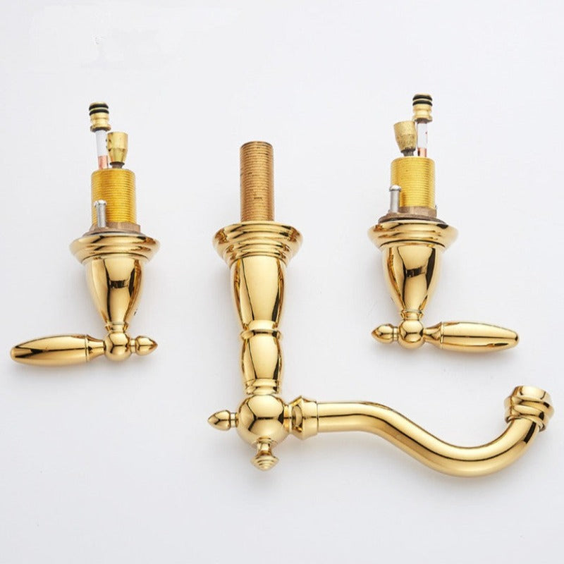Details of Elegant bathroom faucet in gold