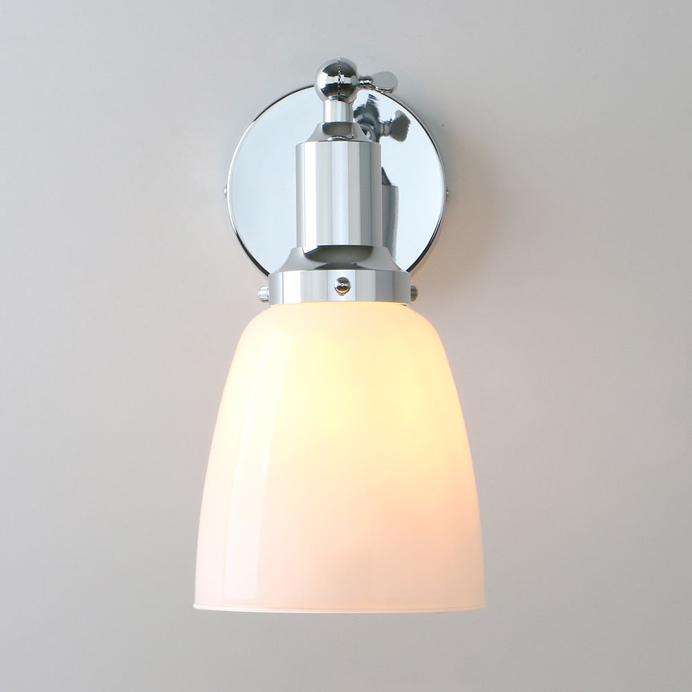 vintage milk glass wall sconce shown in polished chrome finish in on position
