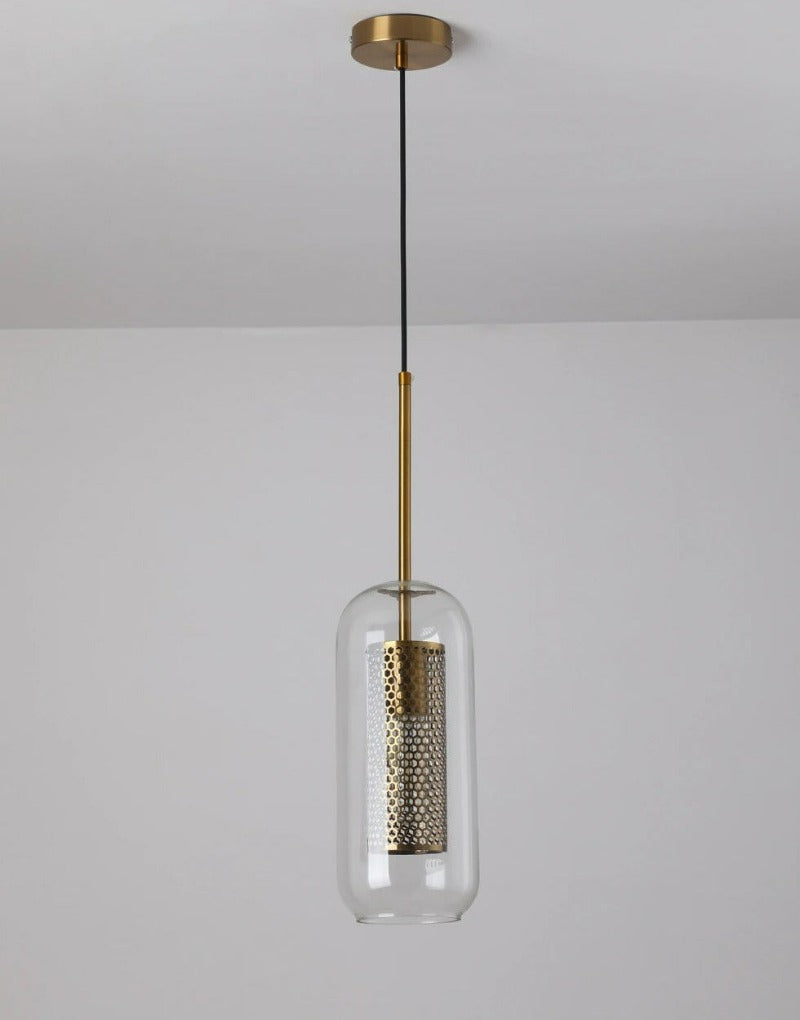 clear glass pendant lights with interior honeycomb shade shown in brushed gold finish shown off