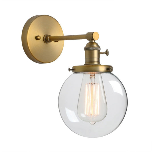 Farmhouse style wall sconce in brushed gold