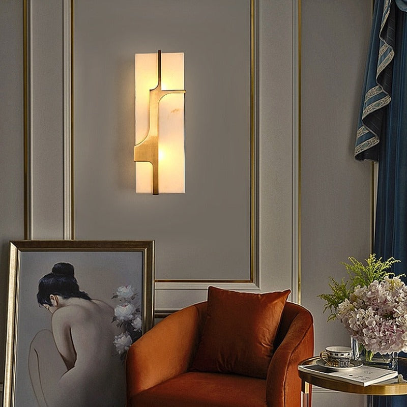 modern marbled glass sconce shown in a living room