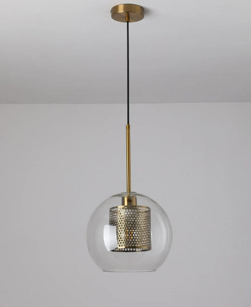 clear glass pendant lights with interior honeycomb shade shown in brushed gold finish