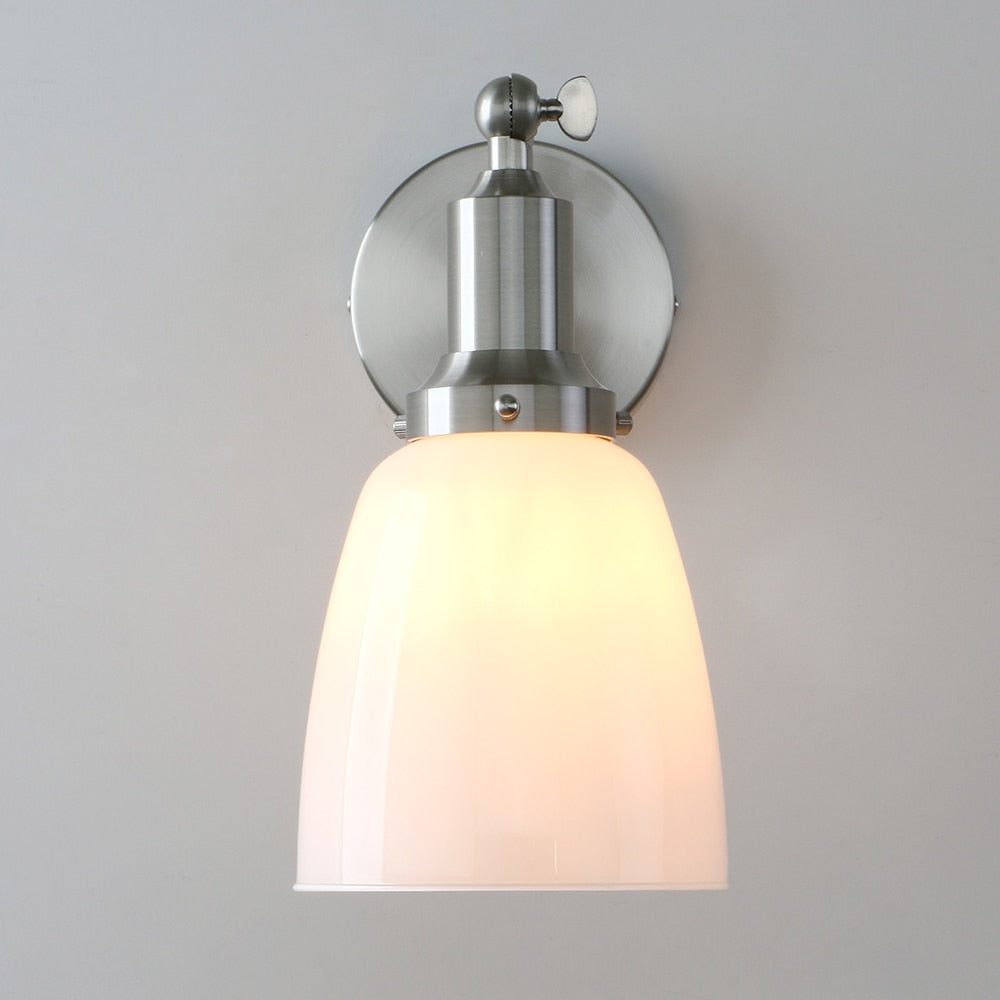 vintage milk glass wall sconce shown in brushed nickel finish