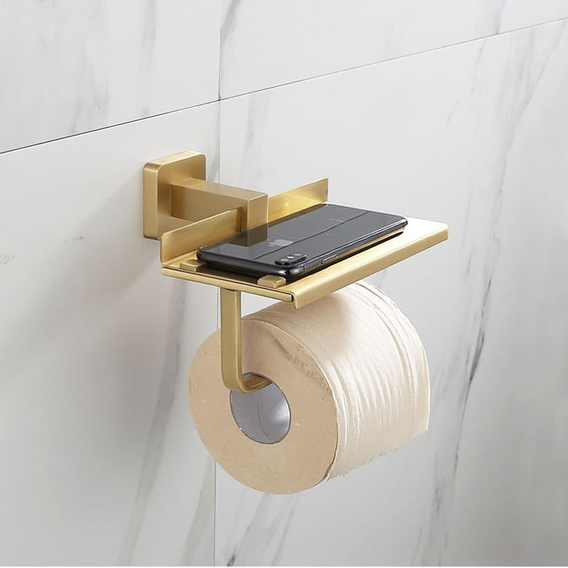 brushed gold toilet paper holder with shelf