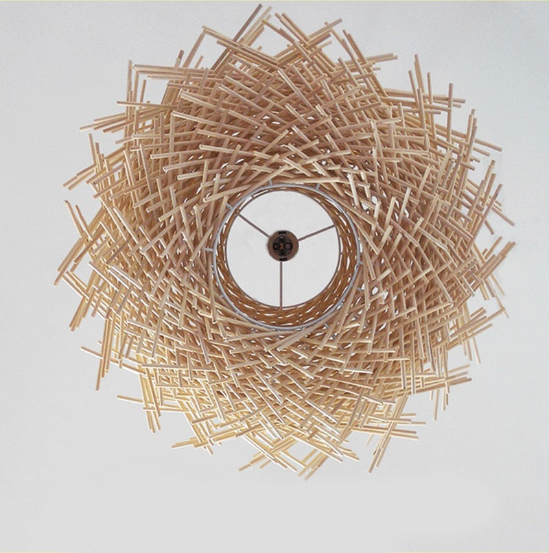 Hand Woven Rattan birds nest hanging pendant light in natural shown from below in the off position