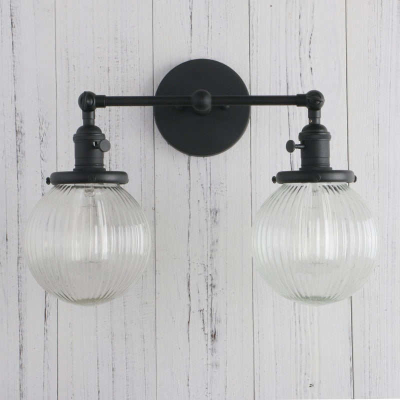 Vintage Double Wall Sconce with clear ribbed glass globes shown in black finish with lights off