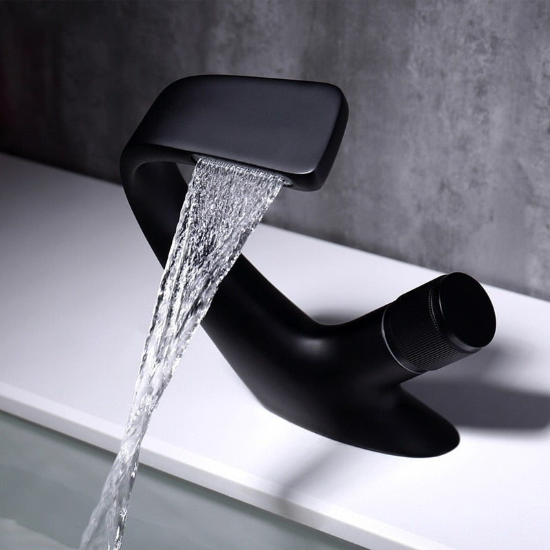 Modern Curved single hole deck mounted bathroom faucet shown in Black