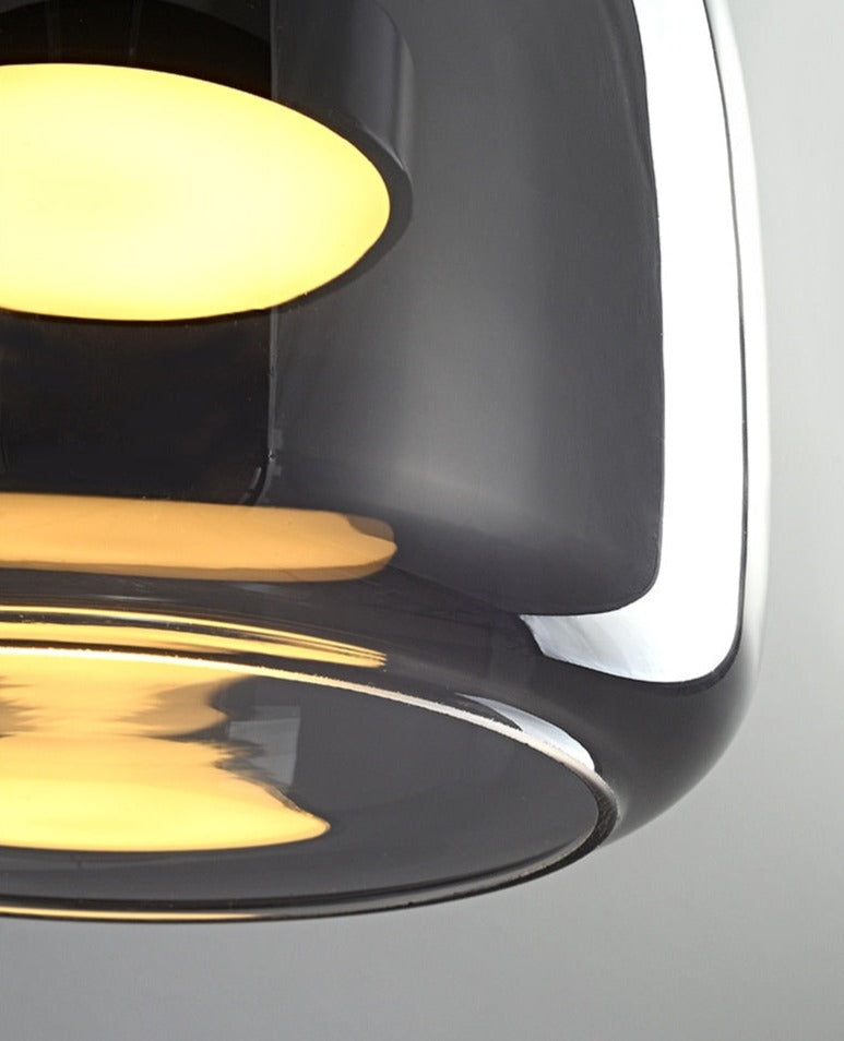 Close up view of modern pendant light with reflective shade