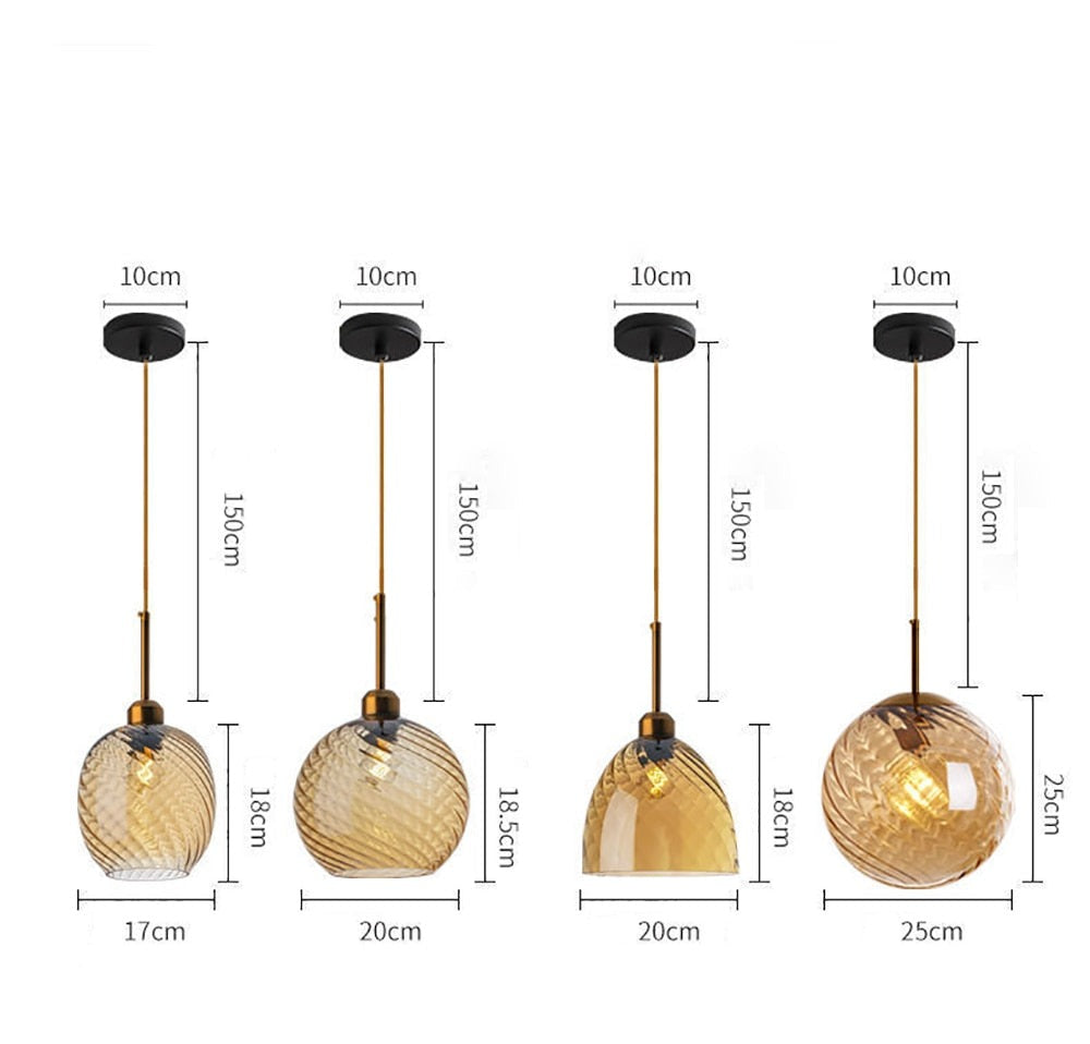 Selection of pendant lights with amber glass globe