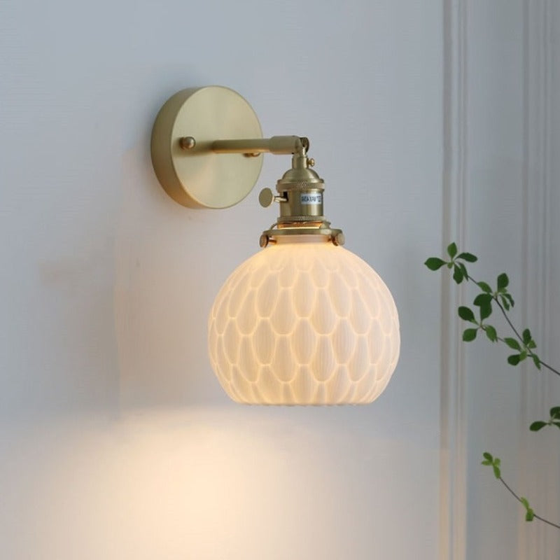 Delicate white ceramic wall sconce