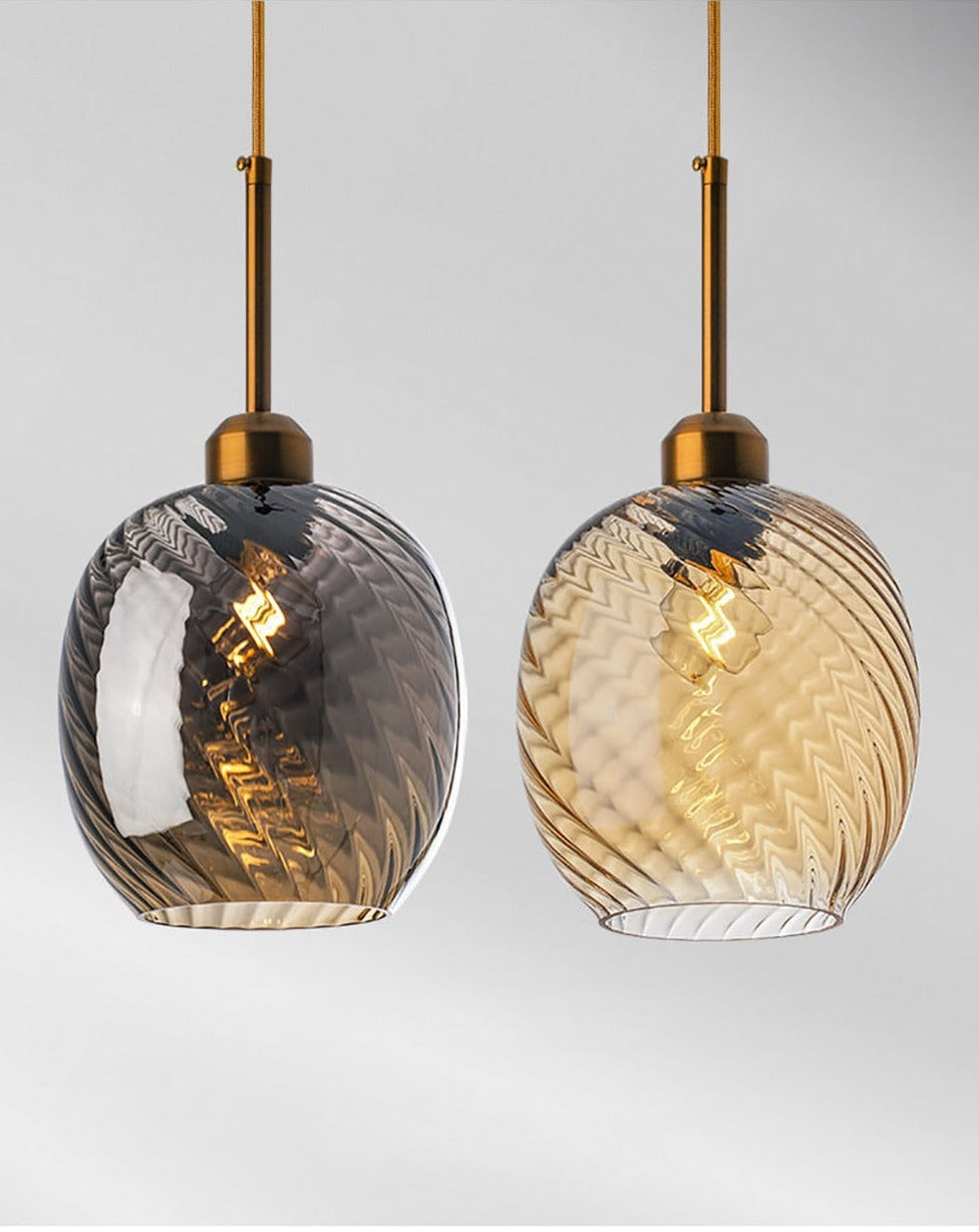 Image of two pendant lights with gray and amber globes