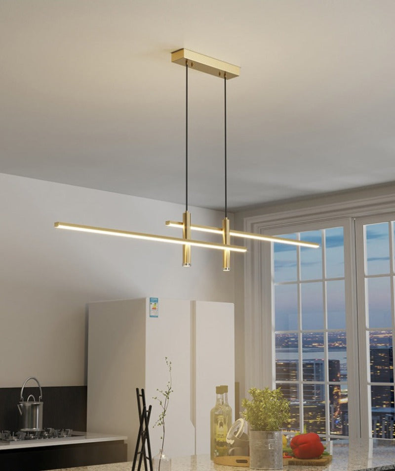 Modern  Hanging Horizontal  Light with two spotlights, 47 inches wide, gold aluminum Frame shown illuminating a modern kitchen island