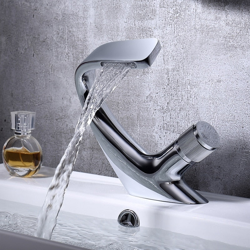 Modern Curved single hole deck mounted bathroom faucet shown in Chrome 