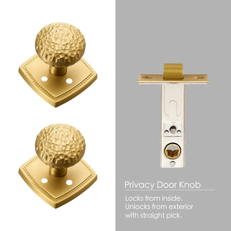 Detail of hardware included with brass interior privacy door knob with hammered finish