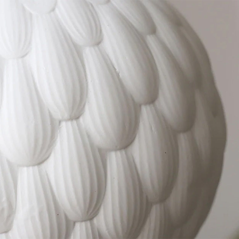 Detailed image of white ceramic wall sconce