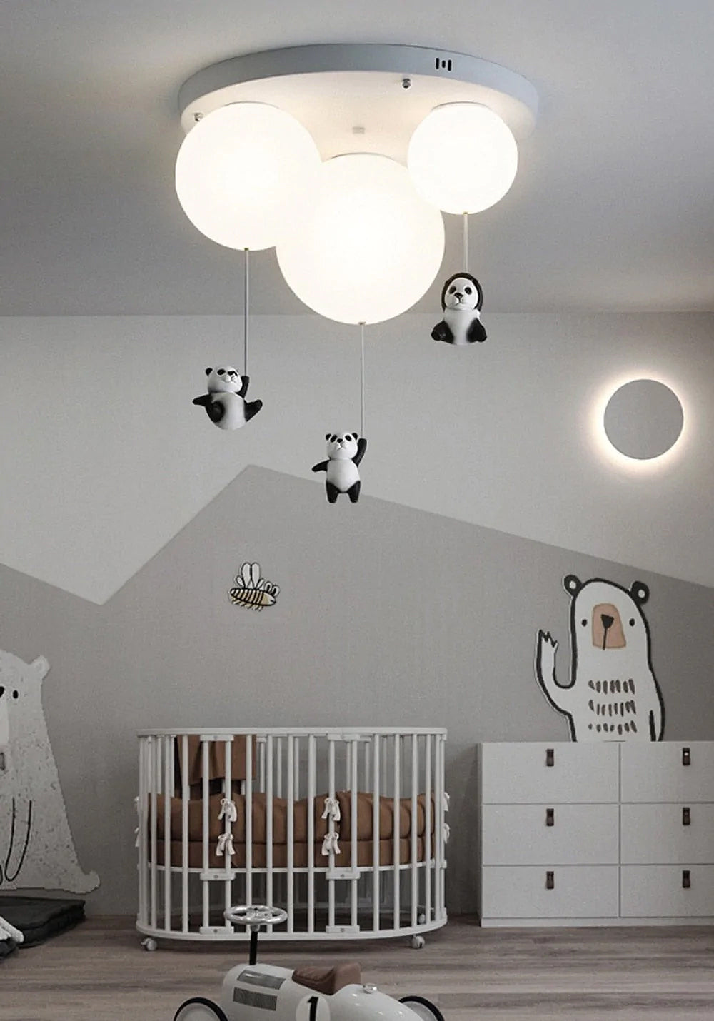 Panda Ceiling Light. Pandas holding onto a balloon ceiling light floating mid air