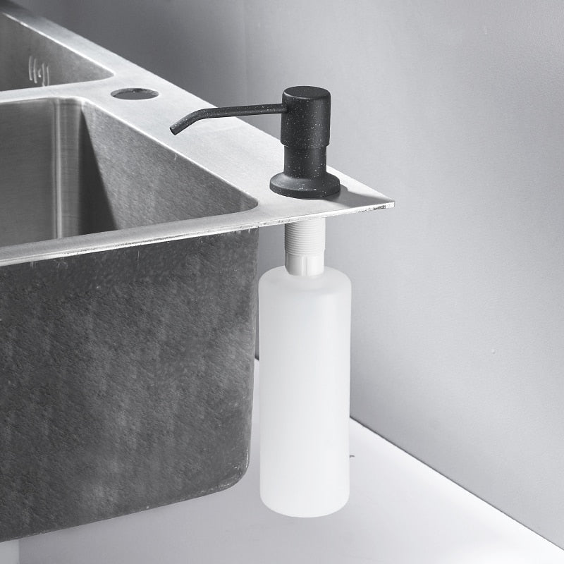side image of kitchen sink deck mounted liquid soap dispenser