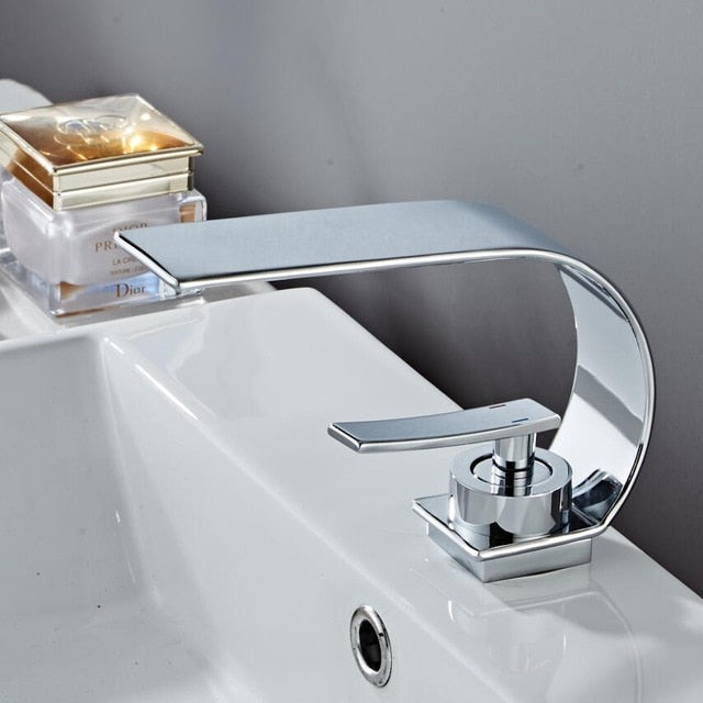Chrome curved bathroom faucet with waterfall flow