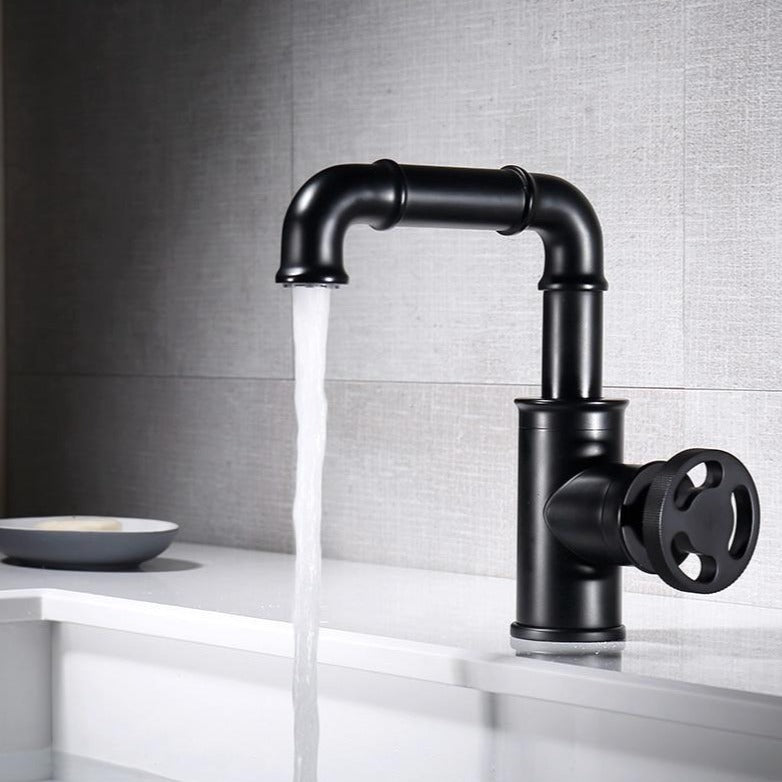 industrial bathroom sink faucet shown in black, single hole
