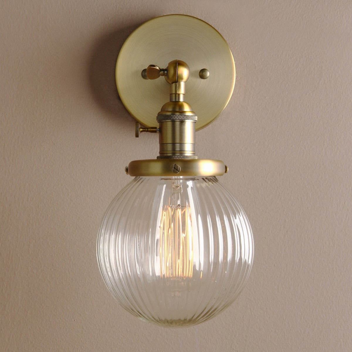 Vintage style Farmhouse Wall Sconce, ribbed Clear Glass Globe in brushed gold finish