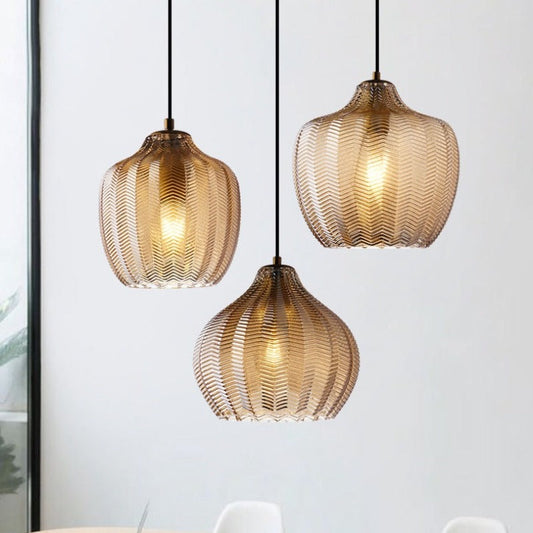 Chevron Patterned Textured Glass Pendant Lights shown in cognac