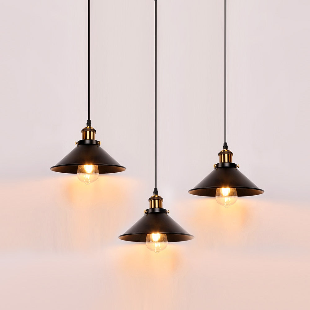 Set of three Black Retro hanging pendant cafe lighting at different heights with edison bulb
