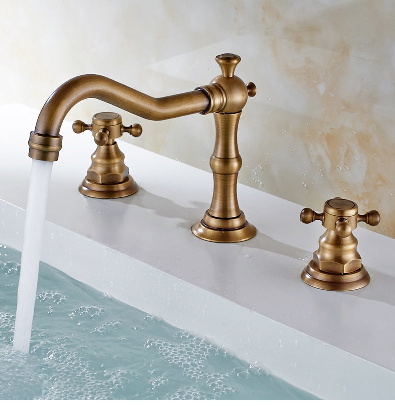 Vintage Style Bathroom Faucet with Cross Handles shown in Antique Bronze