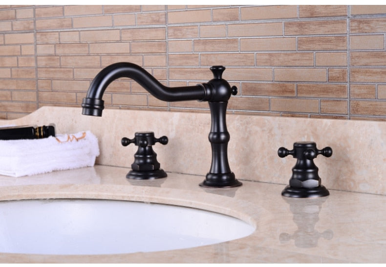 Vintage widespread 3 hole deck mounted bathroom faucet with cross handles shown  in black finish