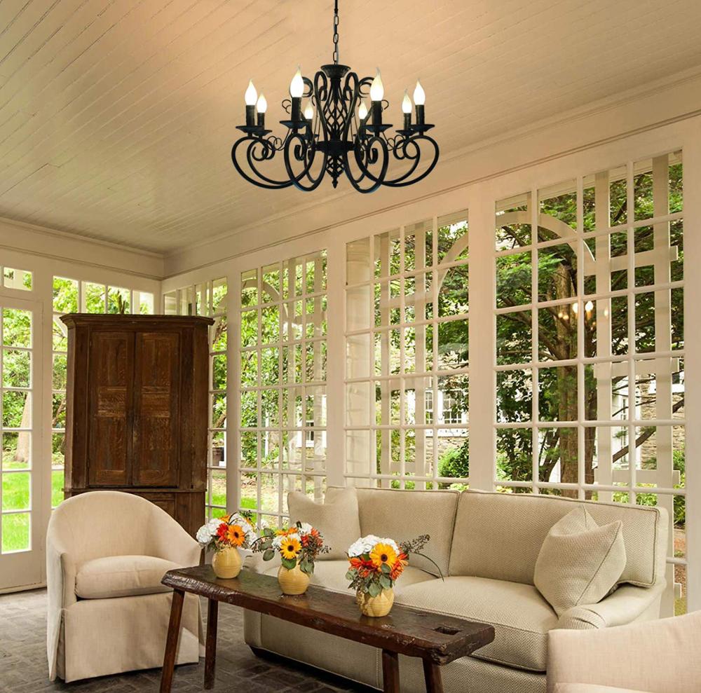 French Country Style Wrought Iron Chandelier with 8 Bulbs shown hung on outdoor covered porch