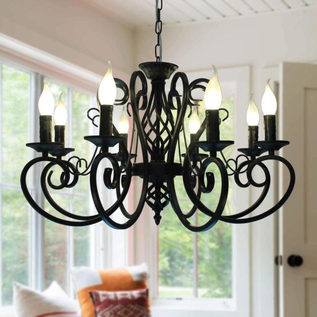 French Country Style Wrought Iron Chandelier with 8 Bulbs shown hanging in living room setting