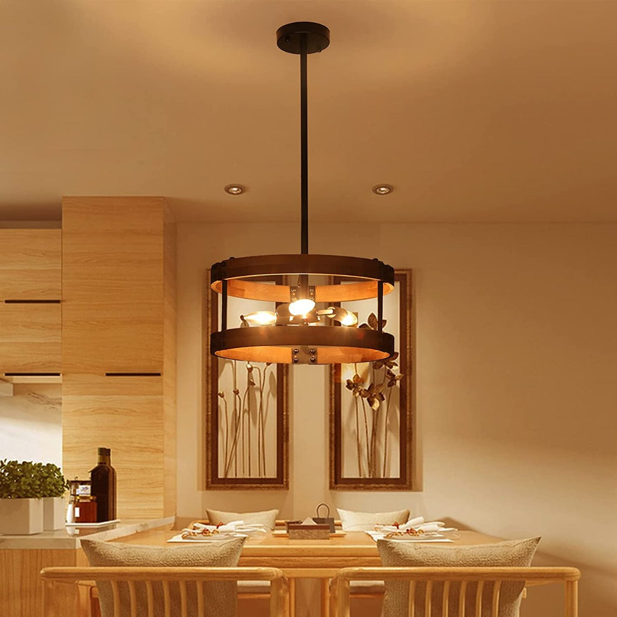 Open Drum Farmhouse pendant light with wood finish shown hanging over dining table