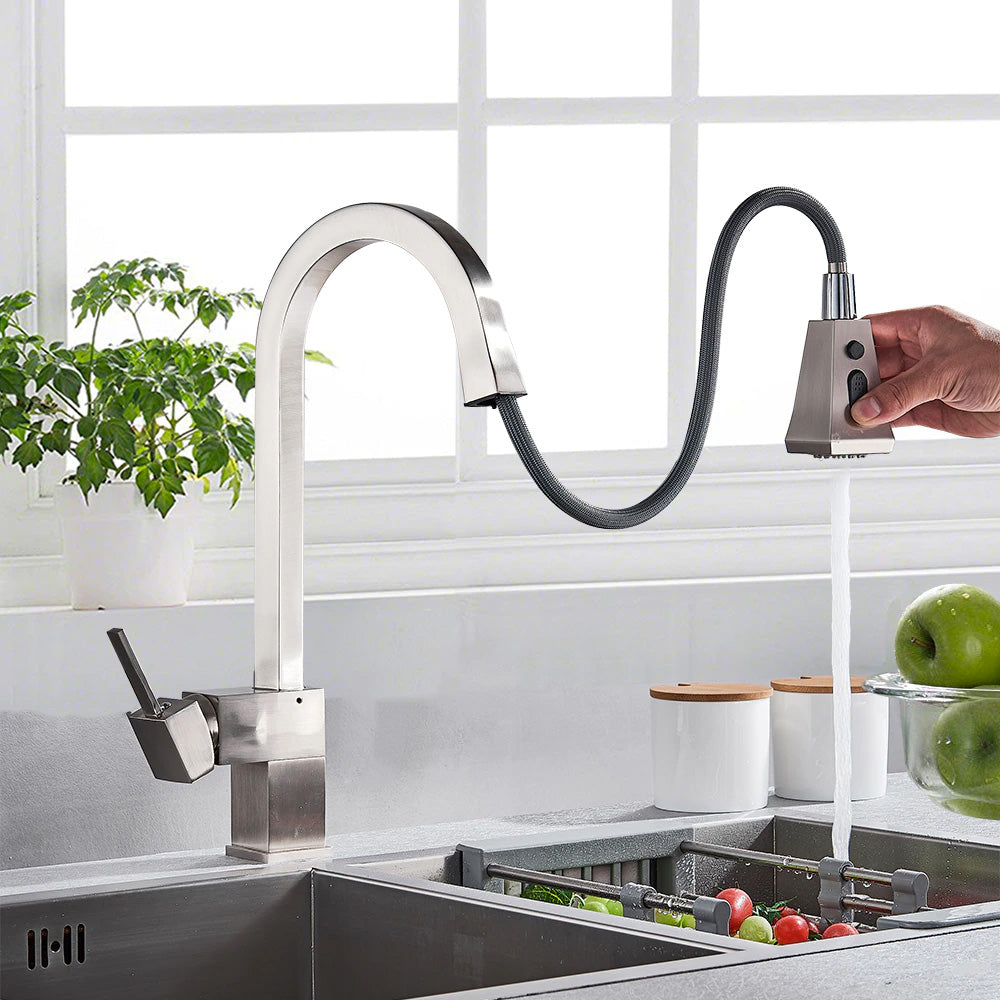 square kitchen faucet in brushed nickel finish shown with pull down sprayer extended